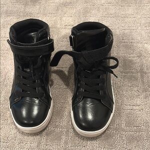 Black High-Top Sneakers with White Soles